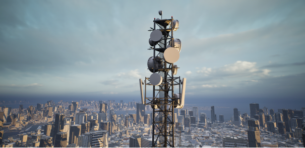 Telecommunications tower overlooking a city skyline.
